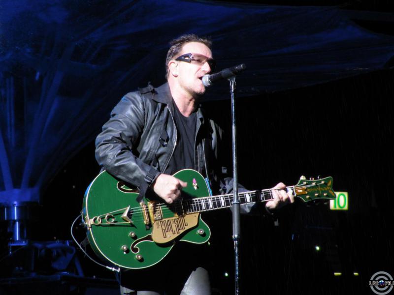 green guitar in the rain
